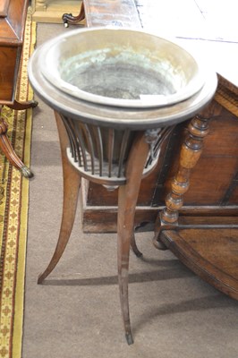 Lot 633 - An Edwardian plant stand with brass lined...