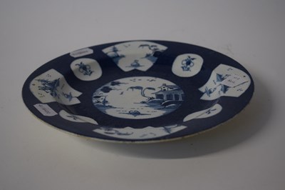 Lot 406 - A Bow porcelain plate, the blue ground with...