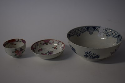 Lot 415 - A Lowestoft porcelain tea bowl and saucer with...