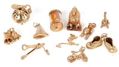 Lot 209 - A quantity of 9ct gold charms, all stamped 375,...