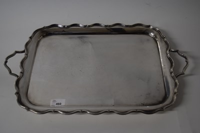 Lot 460 - A silver plated serving tray on four ball feet,...