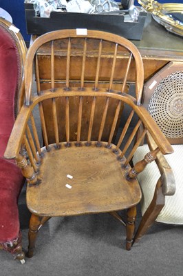 Lot 639 - An elm seated Windsor chair with stick back,...