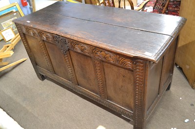 Lot 652 - A large 18th Century oak coffer with hinged...