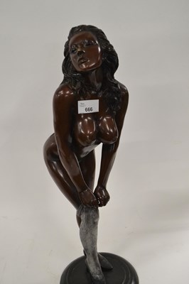 Lot 666 - A 20th Century bronzed metal model of a nude...