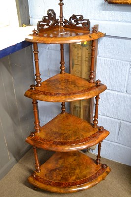 Lot 542 - A Victorian walnut veneered four tier corner...