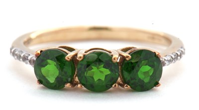 Lot 5 - A 9ct diopside and white stone ring, the three...