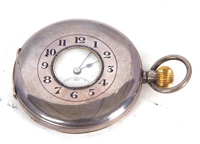 Lot 224 - A white metal half hunter pocket watch stamped...