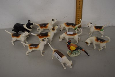 Lot 50 - A group of Beswick fox hounds and others