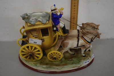 Lot 59 - A German porcelain model of a coach and horses