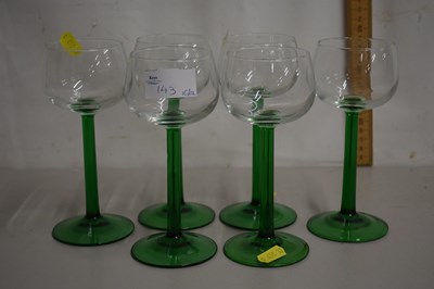 Lot 143 - A set of green stem wine glasses