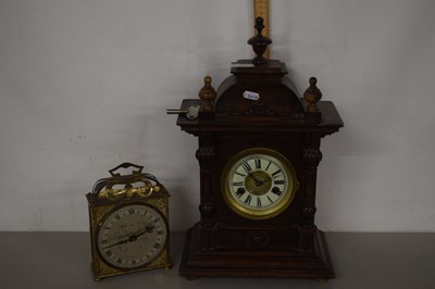 Lot 151 - An early 20th Century oak cased mantel clock...