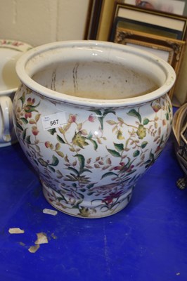 Lot 567 - A floral decorated plant pot