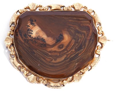 Lot 231 - Large agate brooch, the brown agate panel with...