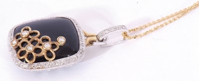 Lot 198 - 14k stamped white gold, onyx and diamond...