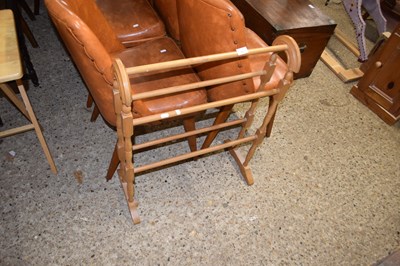 Lot 313 - A light wood towel horse