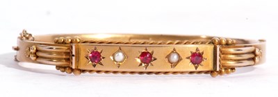 Lot 200 - Antique ruby and seed pearl hollow hinge...