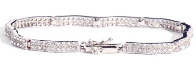 Lot 202 - Modern articulated line bracelet set with...