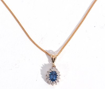 Lot 203 - Modern sapphire and diamond pendant stamped...