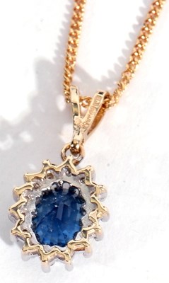 Lot 203 - Modern sapphire and diamond pendant stamped...