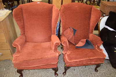 Lot 348 - A pair of 20th Century wing armchairs