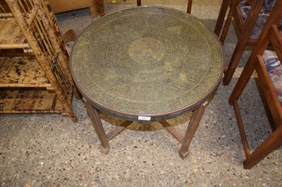 Lot 391 - A brass topped bonares type table