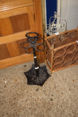 Lot 410 - A cast iron umbrella formed stick stand