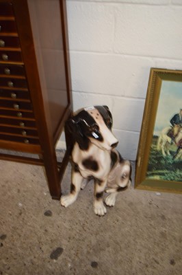 Lot 418 - A modern porcelain fireside dog model