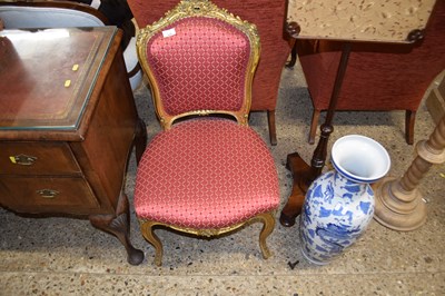 Lot 324 - A gilt painted red upholstered single dining...