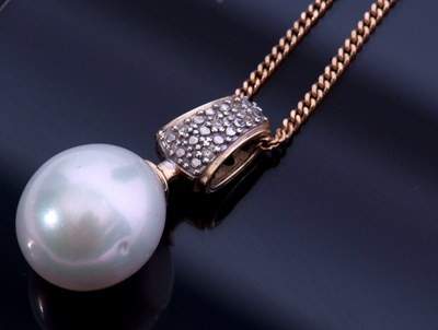 Lot 217 - Modern cultured pearl drop pendant supported...