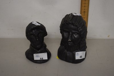 Lot 44 - A pair of glazed pottery busts