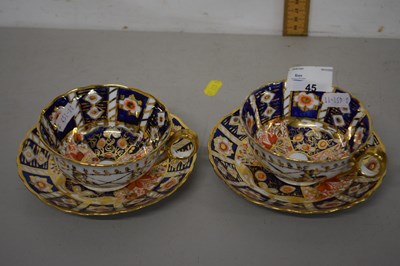 Lot 45 - A pair of English Imari decorated tea cups and...