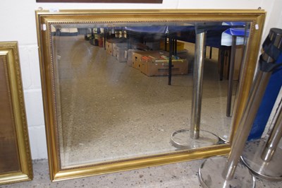 Lot 248 - A 20th Century rectangular wall mirror with...