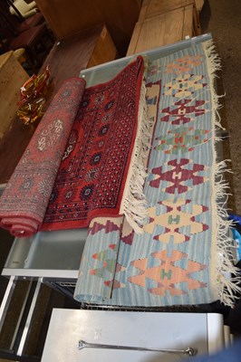 Lot 284 - Modern Middle Eastern red ground wool floor...