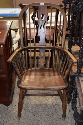 Lot 308 - A stick back Windsor chair