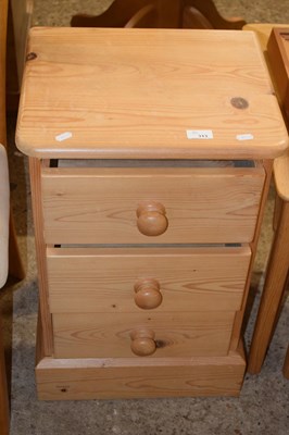 Lot 313 - A pine bedside cabinet