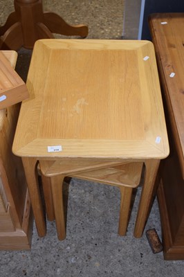 Lot 314 - A nest of three tables