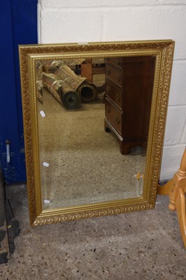 Lot 322 - A bevelled wall mirror in gilt finish frame