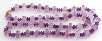 Lot 273 - Large amethyst bead necklace, a single row of...