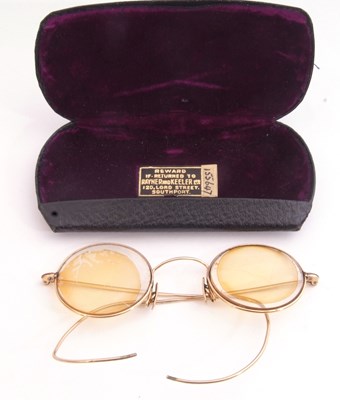 Lot 282 - Pair of vintage gold plated spectacles, cased