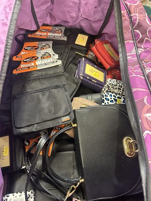 Lot 555 - Large case of various as new wallets, purses etc