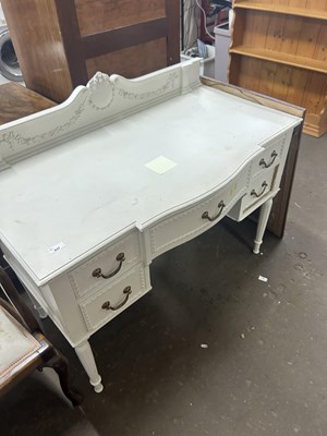 Lot 637 - White painted five drawer dressing table with...