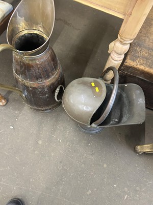 Lot 651 - A large oak and brass mounted jug together...