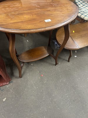 Lot 670 - Edwardian oak two tier occasional table