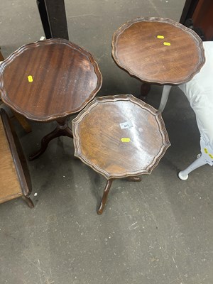 Lot 672 - Three small tripod based wine tables