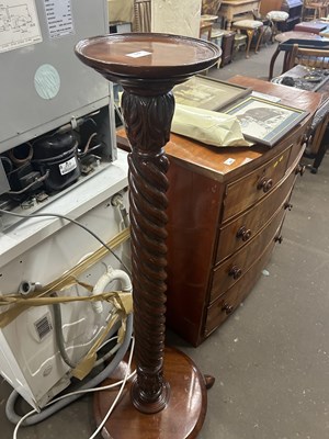 Lot 677 - Mahogany torchere plant stand with barley...