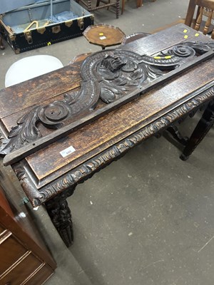 Lot 680 - A Victorian gothic carved oak side table