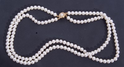 Lot 306 - Double row of simulated pearls of uniform size,...