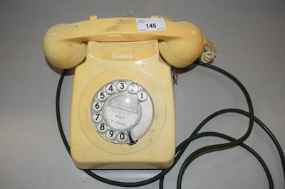 Lot 145 - A vintage cream plastic telephone