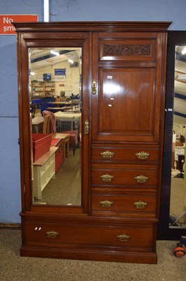 Lot 204 - A late Victorian American walnut wardrobe with...