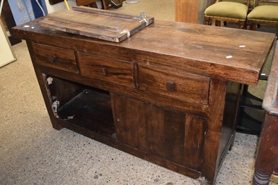 Lot 276 - A dark wood sideboard